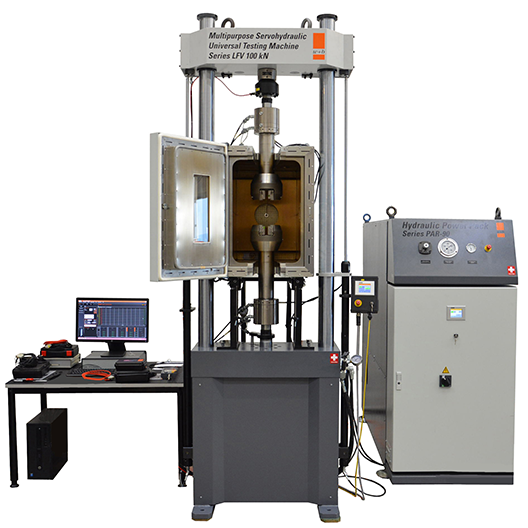 100 kN Servohydraulic Test System with All-Temperature Grips and Environmental Chambe